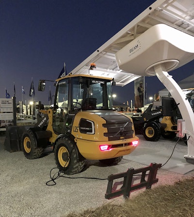 Volvo L25 electric wheel loader charging at The Utility Expo